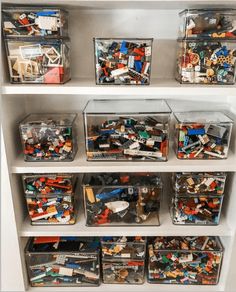 a refrigerator filled with lots of legos and plastic containers