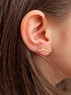 Color: gold Earrings size: 2.3cm/0.6 cm Material: 925 Sterling Silver Weight:1.15grams the price is for one pair of earrings You can make us write your name or the name of the person you love with the Arabic alphabet. The product is made of extremely high quality material. Unbreakable color is 925 silver. It has a solid structure and you can use it for many years. Solid silver Arabic Name earring Personalized Arabic Name earring-Arabic earring silver Islam earring Arabic Jewelry Stylish design e Gold Plated Cartilage Earrings As Gift, Silver Gold Plated Plug Earrings As Gift, Silver Gold-plated Plug Earrings For Gift, Blue Anklet, Arabic Jewelry, Arabic Names, Name Earrings, Minimal Necklace, Earring Silver