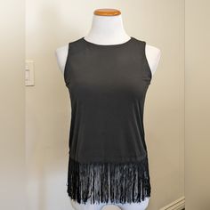 Michael Kors Nwt Sleeveless Black Top With Fringes At End Stretchy Material Round Neckline Msrp$79.50 Approximate Measurements L 18" (With Fringe 23") Pit 18"-19' Waist 16"-17" 95% Polyester & 5% Elastine Machine Wash Chic Fringe Tank Top For Summer, Casual Sleeveless Tank Top For Night Out, Casual Sleeveless Fringe Top, Fitted Fringe Tank Top For Summer, Summer Stretch Fringe Tops, Fitted Sleeveless Tank Top With Fringe, Fitted Casual Tank Top With Fringe, Fitted Sleeveless Fringe Tank Top, Casual Fitted Fringe Tank Top