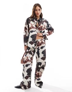 Printed Pants by ASOS DESIGN For days when denim won't do Cow print High rise Drawstring waistband Wide-legged Printed Trousers, Jumpsuit Shorts Rompers, Maxi Dress Trend, Hoodies For Sale, Printed Pants, Plus Size Pregnancy, Drawstring Waistband, Jeans For Sale, Cow Print