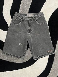 ad eBay - 

(Very worn check photos)


Get your hands on these rare 90s JNCO denim shorts! With a waist size of 33 inches and an inseam of 16 inches, these regular fit shorts are perfect for casual or workwear occasions. The black denim material and embroidered logo accents make them a stylish addition to any wardrobe. 


Made with high-quality denim fabric, these vintage shorts are sure to last. The zip closure and 90s theme add to their unique appeal. Don't miss out on the chance to own a… 90s Theme, Clothing Men, Denim Material, Accessories Clothing, Vintage Shorts, Fashion History, Denim Fabric, Boy Shorts, 90s Fashion