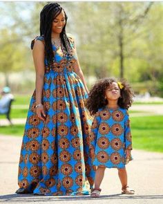 This is an African Print Mom and Daughter Matching Outfit for photo-shoot and other social event. Features: * Brand New 100% cotton fabric of highest grade/quality. * Carefully lined for perfect fit. * Professionally sewn and finished. Before ordering, kindly go through the available fabrics and size chart to make your choice. If you wish to provide your measurements for more perfect fit, kindly send the following: * Bust * Waist * Hip For your daughter, please send her size or measurement to me Mommy Daughter Outfits, Mother Daughter Fashion, Mother Daughter Matching Outfits, Shweshwe Dresses, African Tops, Mom And Daughter Matching, African Dresses For Kids, Afrikaanse Mode, Gaun Fashion