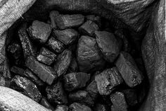 black and white photograph of rocks in a bag