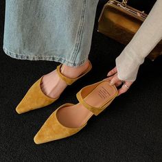 CHIKO Kallie Pointy Toe Block Heels Clogs/Mules Shoes feature suede upper, leather lining, rubber sole. Heel height is approx. 1" (3 cm) The post CHIKO Kallie Pointy Toe Block Heels Clogs/Mules Shoes appeared first on Chiko Shoes. Suede Slip-on Mules With Wooden Heel, Suede Mules For Workwear, Suede Mules With Deep Heel Cup And Round Toe, Suede Clogs With Closed Toe For Work, Suede Closed Toe Clogs For Work, Suede Clogs For Workwear, Yellow Suede Closed Toe Heels, Suede Closed Toe Sandals For Work, Spring Suede Mules With Wooden Heel