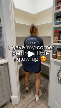 a woman standing in front of a walk in pantry with the caption i gave my corner pantry a little glow up