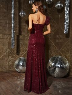 Product Code: FSWD0782 Embellishment: Sequin Fabric: 100% Polyester Back Style: Zipper Up Fully Lined: Yes Built-in Bra: No Available Color: Burgundy Stretch: Moderate Fits true to size Imported Model Information: Height: 5' 2" Bust: 33.5'' Waist: 24“ Hips: 35.5” wearing US size Small Burgundy Sequin Dress, Sequin Dresses, Sequin Fabric, Sequin Dress, Sequin, One Shoulder, Bra, Zipper, How To Wear