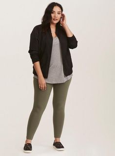 With the top to bottom fit you love (tapered leg included) and thicker fabric (so cozy). A thicker elastic waistband smooths and flatters your tummy. High waist. Wide thick waistband. Second-skin fit. Tapered leg. CONTENT + CARE: Cotton/spandex. Wash cold; dry low. Imported plus size leggings. SIZE + FIT: 28” inseam. Model is 5'10”, size 1. The best plus size women's full length signature waist premium legging leggings in bonsai green made of premium. Rock your look from Torrid to Festivals like Olive Green Leggings Outfit, Green Leggings Outfit, Black Leggings Outfit, Legging Fits, Green Leggings, Best Leggings, Plus Size Leggings, Tapered Pants, Athletic Fashion