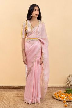 Shop for Pita Nila Pink Satin Silk Organza Soha Embroidered Saree With Kira Print Blouse for Women Online at Aza Fashions Cotton Silk Pre-draped Saree With Mirror Work, Pink Cotton Silk Pre-draped Saree For Reception, Embellished Pink Blouse Piece For Eid, Pink Embellished Saree For Eid, Pink Embroidered Cotton Silk Pre-draped Saree, Designer Wear Pink Pre-draped Saree For Transitional Seasons, Transitional Pink Saree With Mirror Work, Pink Embellished Organza Saree, Pink Embroidered Pre-draped Saree For Reception