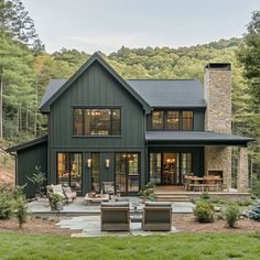 a large house with lots of windows in the front