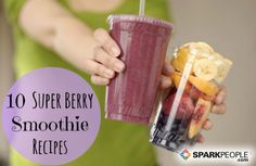 a woman is holding a smoothie in her hand and the words, 10 super berry smoothie recipes