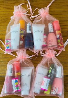 four clear bags filled with personal care items