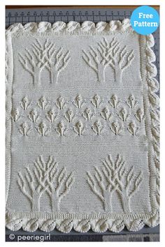 a white crocheted blanket with trees on it and the words free pattern below