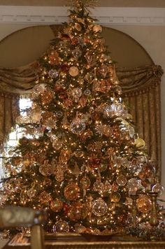 a christmas tree with many ornaments on it