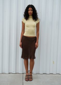 The Rosie Skirt is a sheer, double-layered, knee length silk skirt with a bias hem and elastic waist. Made in collaboration with Cierra O'day Style Inspiration Going Out, Slip Skirt And Tshirt, Minimalism Summer Outfit, Cierra O'day, Mini Slip Skirt Outfit, Thrifted Skirt Outfit, Bias Skirt Outfit, Oversized Shirt And Skirt Outfit, Knee Length Skirt Outfits