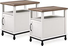 two white storage cabinets with wooden tops