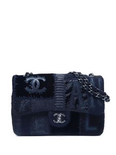 circa 2017 black denim patchwork design signature interlocking CC logo fabric and chain-link shoulder strap front flap closure signature interlocking CC turn-lock fastening main compartment internal zip-fastening pocket silver-tone hardware Serial number: 25706707 This item comes with an original authenticity seal. This item comes with an original Chanel authenticity card. Condition: EXCELLENT. This previously owned item is in near-perfect condition with no signs of damage or use. Chanel Denim, Classic Flap Chanel, Chanel Bags, Unique Chanel Bag, Navy Chanel Bag, Vintage Chanel Bag 1stdibs, Vintage Chanel Flap Bag, Limited Edition Chanel Bag, Farfetch Chanel Bag