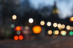 blurry image of city street lights at night