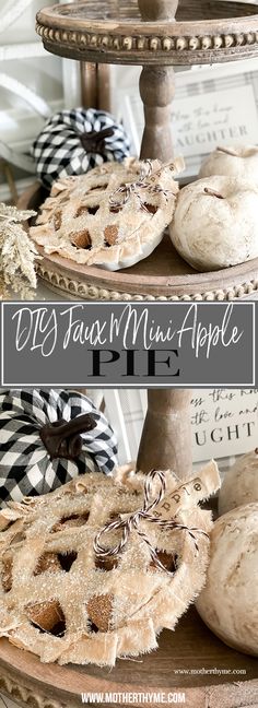 two pies sitting on top of a cake stand with the words diy faux mini - apple pie