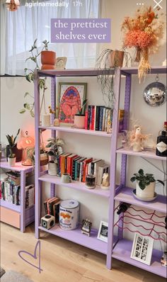 a purple book shelf filled with lots of books