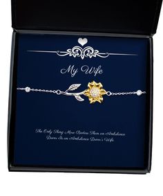 This Wife Sunflower Bracelet is the perfect gift for the person who brings you happiness. Sunflowers are known for their beauty and ability to bring joy. Made of .925 sterling silver metal, this necklace features a single sunflower that will surely brighten up your day! This item arrives gift-ready in our custom packaging with a lovely message card. Certificate of Authenticity Card - Features the GearBubble Seal Of Authenticity, which certifies that the jewelry is handmade and crafted in genuine Single Sunflower, Sunflower Bracelet, Aunt Birthday, Wife Jewelry, Step Mom Gifts, Gifts For Fiance, Mama Gifts, Dear Mom, Aunt Gifts