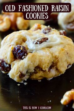 an old fashioned raisin cookies with white icing and nuts on the top is shown