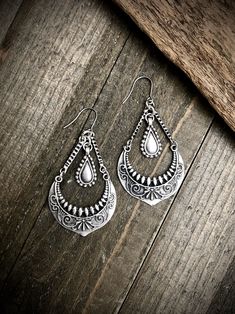 "These silver chandeliers have a rustic boho feel and are the perfect size. They have stainless steel ear wires and measure 2.75\" long and 1.5\" wide. ▲ To see more, click here to return to my shop: https://www.etsy.com/shop/AspenGlowStudio ▲ Don't forget to favorite my shop for updates Many of my designs have natural stones, these stones will slightly vary from one another so remember that yours may not be exactly like the ones pictured but they will be VERY similar. Please be careful with you Rustic Silver Jewelry For Festivals, Bohemian Metal Chandelier Earrings For Festivals, Bohemian Sterling Silver Chandelier Earrings, Bohemian Sterling Silver Chandelier Earrings For Festivals, Bohemian Metal Chandelier Earrings With Ear Wire, Bohemian Metal Chandelier Earrings Nickel Free, Bohemian Nickel-free Chandelier Earrings, Nickel-free Bohemian Chandelier Earrings, Bohemian Nickel-free Metal Chandelier Earrings