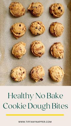 healthy no bake cookie dough bites on a baking sheet with text overlay that says healthy no bake cookie dough bites