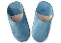 Comfortable and Soft Men's Denim Blue Leather slip-on Babouche Slippers. These super comfy leather slippers are natural, breathable, will mould themselves to the shape of your feet and are perfect for relaxing in the mornings and evenings after a hard days work. The ideal gift, and of course, the ultimate work from home footware! Our babouches are made using soft supple organic sheeps leather which has been processed naturally without the use of nasty chemicals such as chromium. The leather is hand dyed in our bespoke range of colours and our babouche maker then cuts the leather and handmakes the babouche with a skill that is passed down from generation to generation, keeping the traditional artisanal craft alive. As these babouche are handmade they may have some imperfections making them Leather Slip-on Mules For Indoor, Comfortable Blue Leather Clogs, Blue Leather Mules With Leather Sole, Blue Leather Slippers With Round Toe, Blue Leather Closed Toe Slippers, Babouche Slippers, Leather Slippers For Men, Handmade Slippers, Sheepskin Slippers