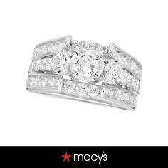 a diamond ring with two rows of diamonds on the side and an inscription that reads macy's