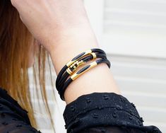 Description:  Women's Wrap Leather Bracelet, Gold Tube Leather Bracelet, Gift Bracelets for Girlfriend, Stackable bracelets and Leather Cuff for Women. I make the bracelets from genuine leather cord, from zinc alloy (leads free) which has silver and gold plated or antique bronze oxidation. All the materials I use are hypoallergenic. I am happy to work with you to come up with a completely different and custom design to gifts. These specially designed bracelets will be a nice gift for your loved ones on their special occasions. Our made genuine leather bracelets,   - Bracelets Leather for Woman,  - Bracelet for mens - Wedding Gifts,  - Mothers and Fathers Day Gifts,  - Anniversary Gifts,  - Birthday Gifts,  - Valentines Day Gifts,  - Hapy New Year Gifts,  - Christmas Gifts and for any other Trendy Double Band Bracelets As Gift, Trendy Double Band Bracelets For Gifts, Double Band Bracelets With Leather Strap As Gift, Double Band Leather Strap Bracelets As Gift, Double Band Leather Strap Bracelet Gift, Trendy Leather Bracelet As Gift, Leather Strap Double Band Bracelets Ideal For Gifts, Trendy Leather Bracelet Gift, Adjustable Double Band Wrap Bracelet Gift