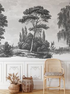 a room with a chair, potted plant and wallpaper