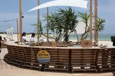 an outdoor bar is set up on the beach