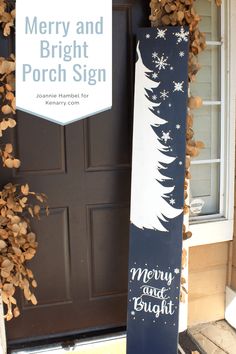 a merry and bright porch sign sitting in front of a door with snowflakes on it