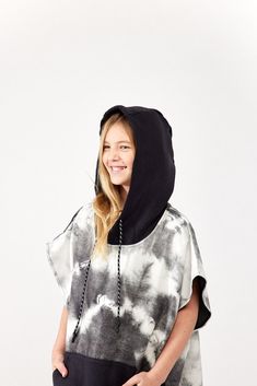 Your favorite towel, now in a poncho Whether you need to change before surfing, after wakeboarding, or just want to cozy up around the fire, the Tie-Dye Black and White Nomadix Changing Poncho is a versatile, classic poncho that everyone will love. Black And White Surf, Dry Sand, Wakeboarding, White Tie, The Fire, Tie Dye Top, Surfing, Tie Dye, Dye