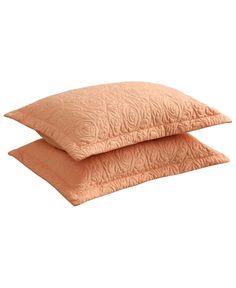 two pillows sitting on top of each other