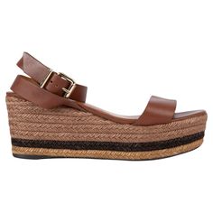 100% authentic Fendi ankle-strap espadrilles wedge sandals in brown leather with striped raffia sole and gold-tone buckle closure. Have been worn and are in excellent condition. Measurements Imprinted Size 41 Shoe Size 41 Inside Sole 26cm (10.1in) Width 8cm (3.1in) Heel 8cm (3.1in) Platform: 4cm (1.6in) All our listings include only the listed item unless otherwise specified in the description above Ankle Strap Wedges, Strap Wedge, Leather Espadrilles, Espadrilles Wedges, Wedge Sandals, Ankle Strap, Clothing And Shoes, Brown Leather, Shoes Sandals