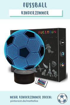 a soccer ball sitting on top of a table next to a box with the words fusball kinder1imer