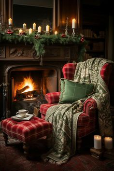 a chair and ottoman in front of a fire place with candles on the mantel