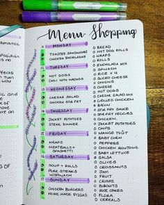 an open planner with the words menu shopping written in purple and green ink on it