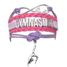 two bracelets with the word gymnastics on them and a key charm hanging from it