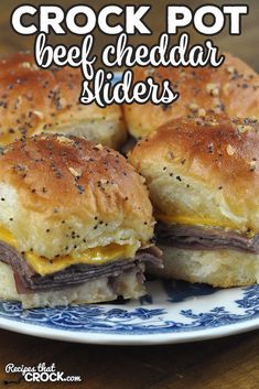 crock pot beef cheddar sliders on a blue and white plate with text overlay