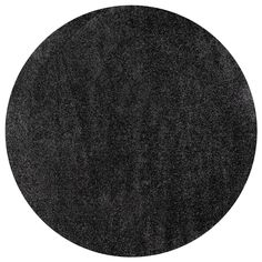 a round black rug on a white background