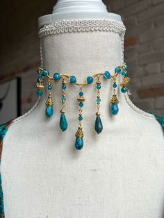 Empress choker made with blue apatite and adorned with gold accents  Fits up to 16 inches Spiritual Blue Choker Jewelry, Fairy Jewellery, Fantasy Outfits, Pretty Crafts, Hand Design, Fairy Jewelry, Syracuse Ny, Beaded Jewellery, Pretty Jewelry