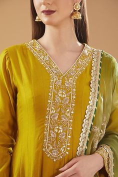 Mustard chanderi silk anarkali with placed floral vine dabka embroidery, highlighted by beads and gota. Comes with palazzo and shaded embroidered dupatta. - Aza Fashions Festive V-neck Kurta With Zari Work, Festive V-neck Salwar Kameez For Wedding, Elegant Straight Kurta Choli For Diwali, Festive Chanderi V-neck Kurta, Elegant Festive Churidar With Cutdana, V-neck Salwar Kameez With Dabka Work For Wedding, Festive V-neck Salwar Kameez With Zari Work, V-neck Salwar Kameez For Diwali Wedding, Diwali V-neck Sharara With Dupatta