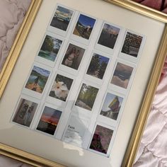 a gold framed photo with many pictures in it on a pink bed sheet and some pillows