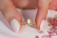 You can use it as a Opal Ring Gold 14K. Our Delicate Multicolor Opal Birthstone Stacking Ring is use as October Birth stone Band. This 10K 14K 18K Gold Colorful Gemstone Jewelry looks like 10K multicolor ring. Custom Personal Ring will be perfect gift for her as a mother. Dainty Birthmonth ring gift can be customized with your Birthstone or wedding month stone. We can turns it into a brilliant colorful opal ring. Our 18K bridesmaid ring is great multicolor accessory for her daily life. Its unique delicate ring exact matches with opal ring gold 14K. This stunning opal stacking ring symbolizes your love and serves as the ideal gift for your best friend, girlfriend, mom or grandmother. Please check our other birthstone rings: https://www.etsy.com/shop/minifinejewels?ref=seller-platform-mcnav& Opal Stacking Ring, Birthstone Stacking Rings, Bridesmaid Rings, Opal Birthstone, Opal Ring Gold, Ring Minimalist, Solid Gold Rings, Delicate Rings, Opal Ring