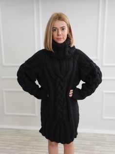 "Perfect for work or evening events, this black turtleneck wool sweater is a classic piece to go with anything in your closet. The chunky knit and slightly oversize loose fit has 2 layers of high quality wool that's made for comfort and good visual look. DETAILS - The sweater has 2 layers of wool - Made from 100% high quality wool - The sweater is knitted with 76 oz (1900g) of high quality premium mohair - The model is 170 cm tall (regular S) - The sweater on picture is size 3XL - As mostly all Warm Oversized Black Sweater, Thick Turtleneck Winter Sweater, Thick Wool Sweater With Long Sleeves, Oversized Thick Winter Sweater, Thick Oversized Winter Sweater, Winter Turtleneck Chunky Knit Cardigan, Winter Chunky Knit Turtleneck Cardigan, Knitted Acrylic Turtleneck Outerwear, Oversized High Neck Cable Knit Sweater