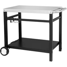 a black and white workbench with wheels