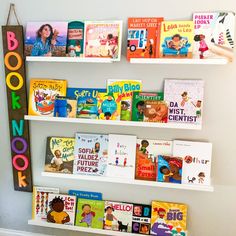 the children's bookshelf is decorated with colorful book covers and stickers