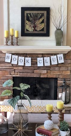 a living room with a fire place and books on the mantel above it is a sign that says book club